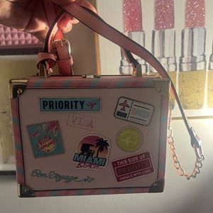 Pink top handle/ crossbody ALDO Patch purse.